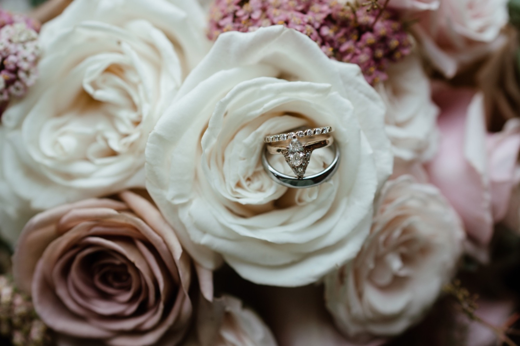 ring and flower details at 8th and main wedding