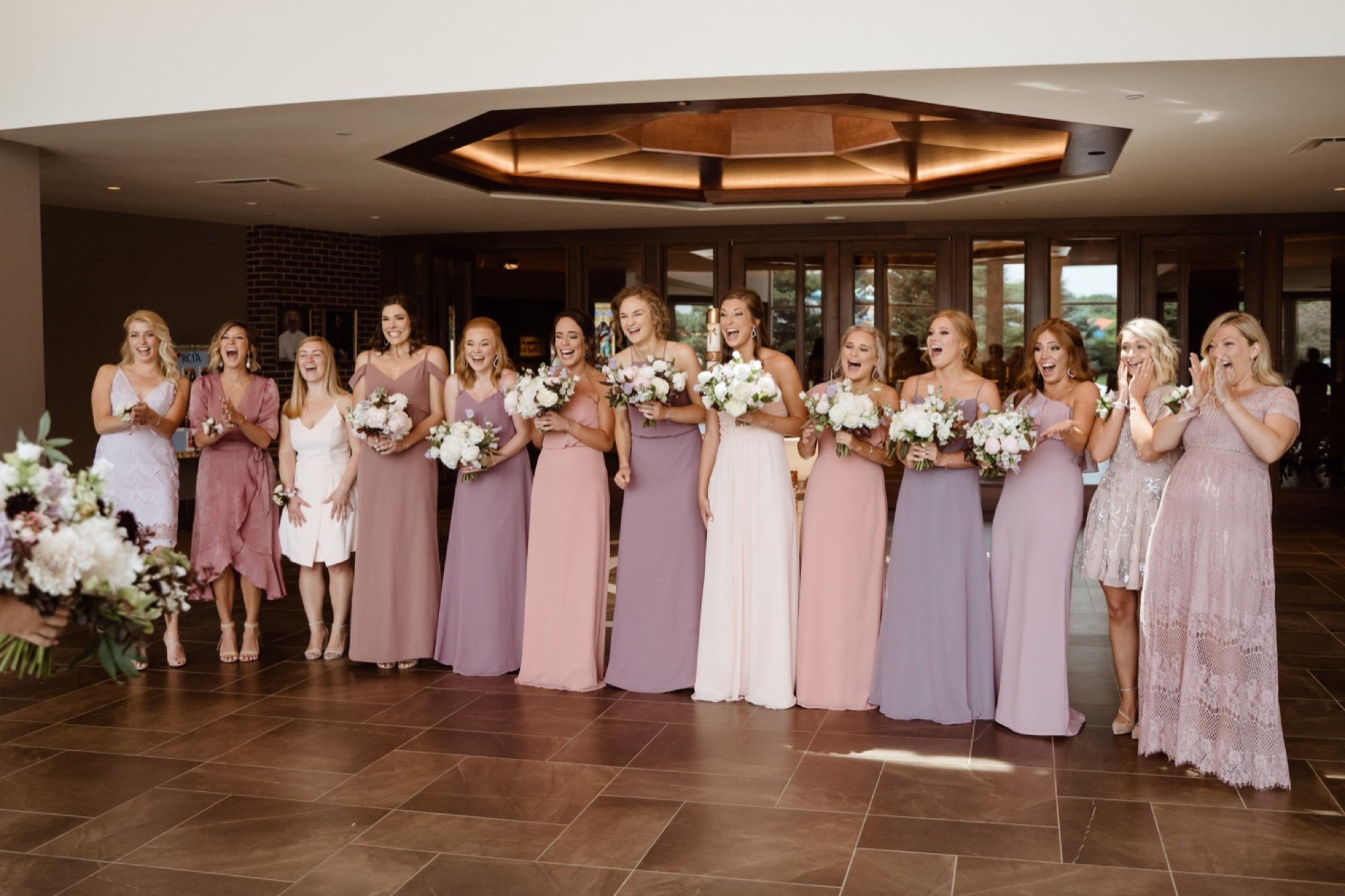 bridesmaids see bride for first time at st joseph catholic church