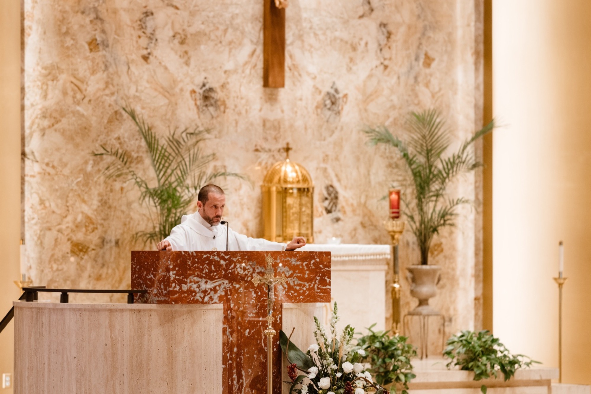 priest gives mass at st joseph catholic church