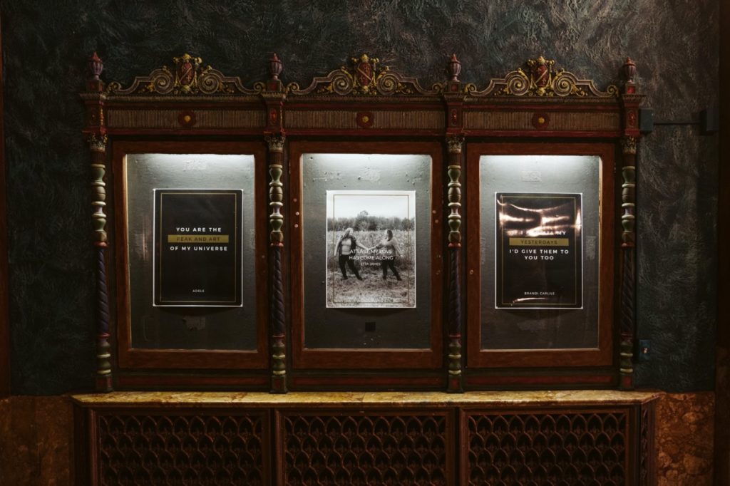 movie poster case at uptown theater wedding